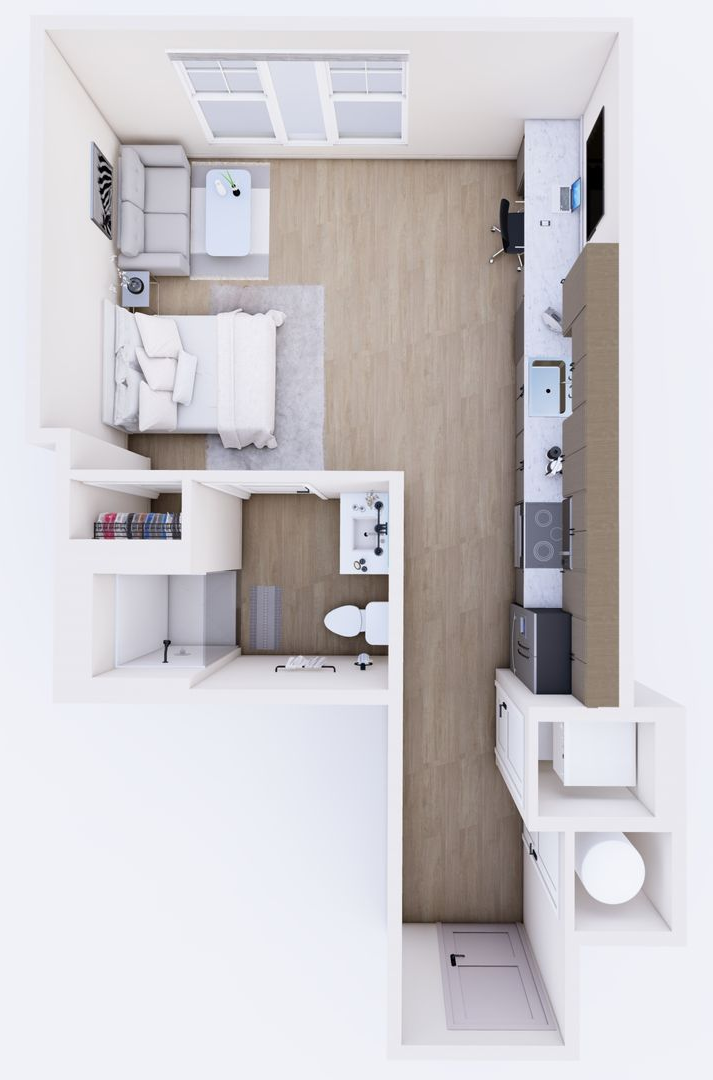 Top-down view of a studio apartment floor plan with a bed, kitchenette, seating area, and bathroom.