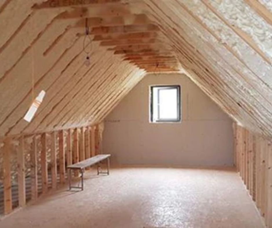 Residential attic cleared and prepped for spray foam insulation installation.