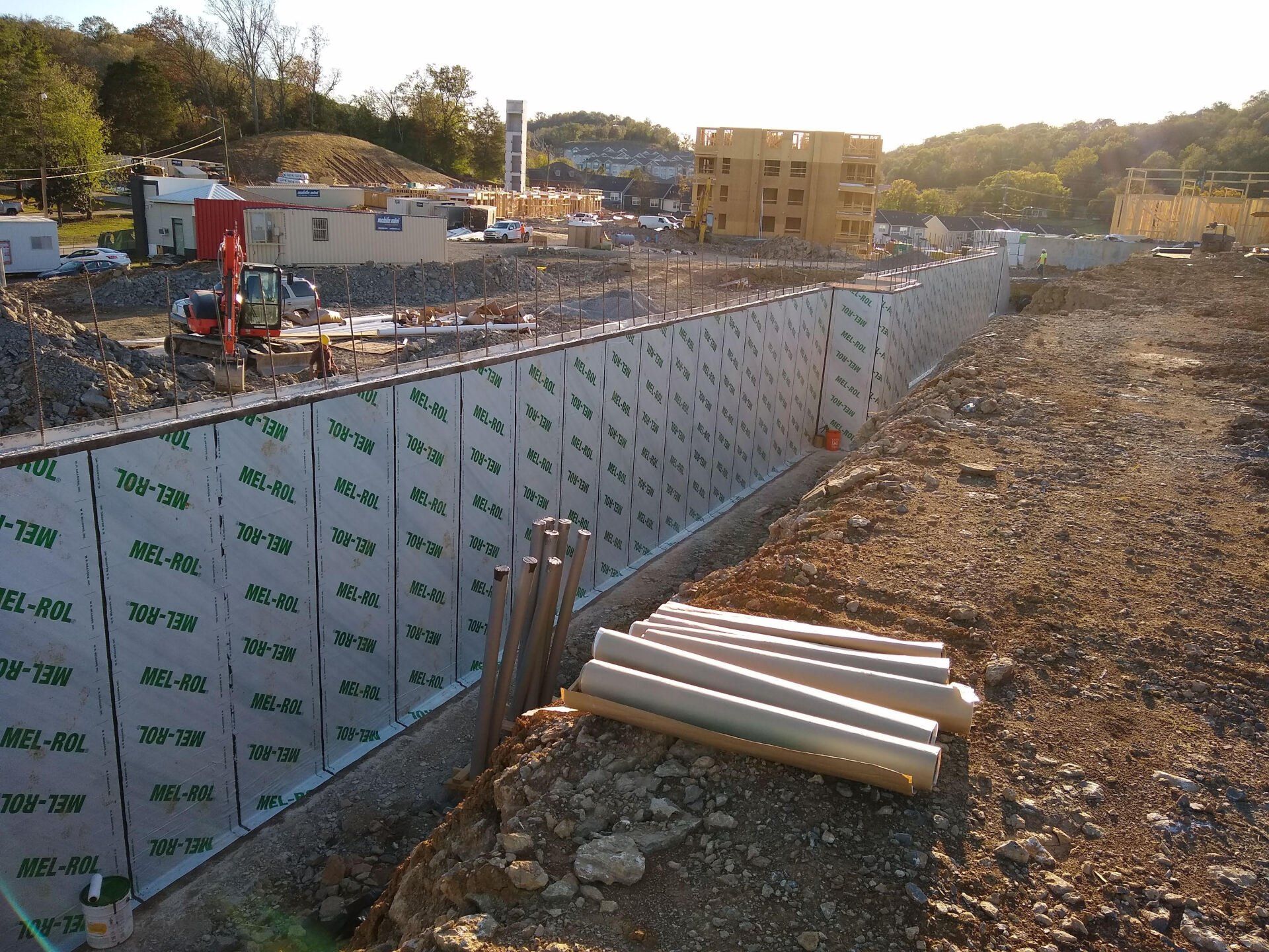 a large waterproof wall is being built in a construction site