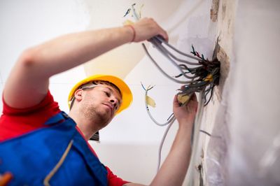 Electrician organizing house wiring