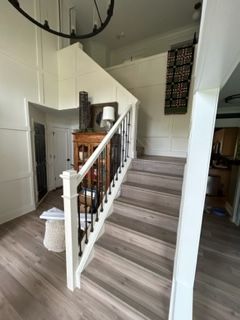 A set of stairs leading up to a second floor in a house.