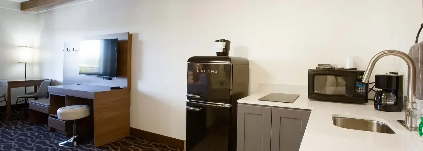 Dreamcatcher Inn Sedona boutique hotel room with kitchenette and desk
