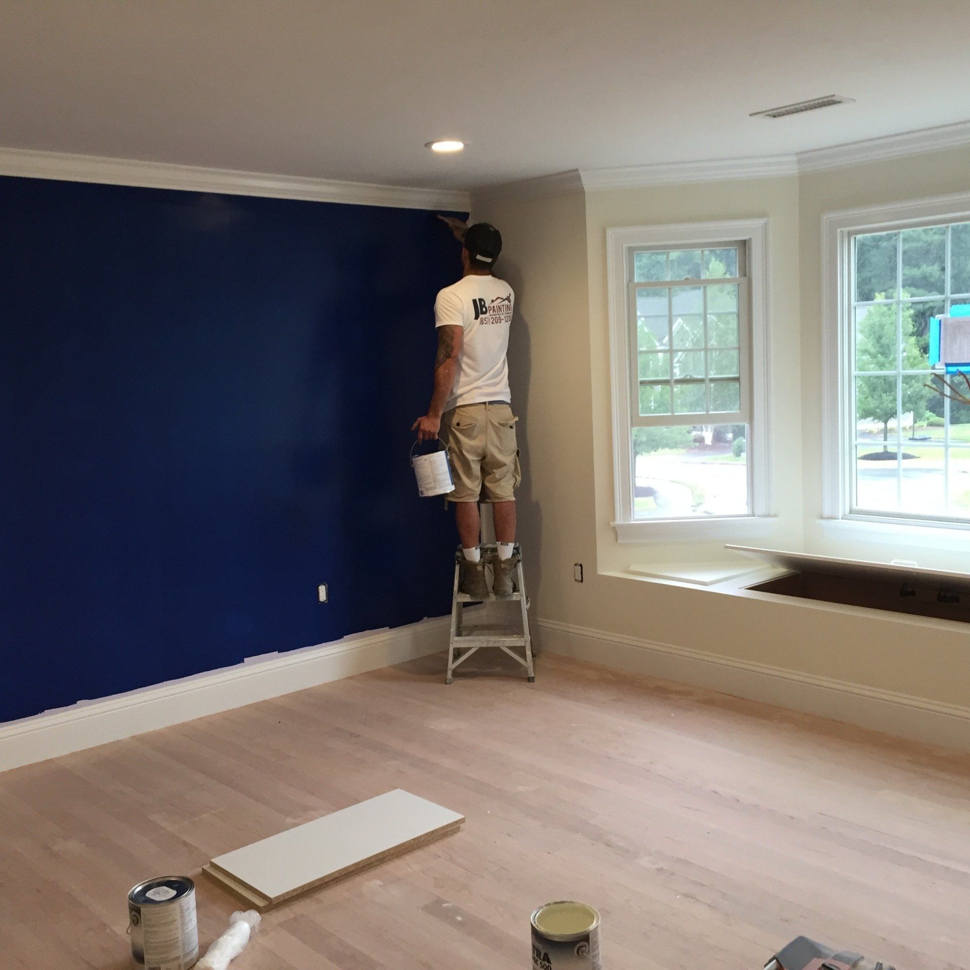 Exterior view of new house under construction and painting.House Painting in morning