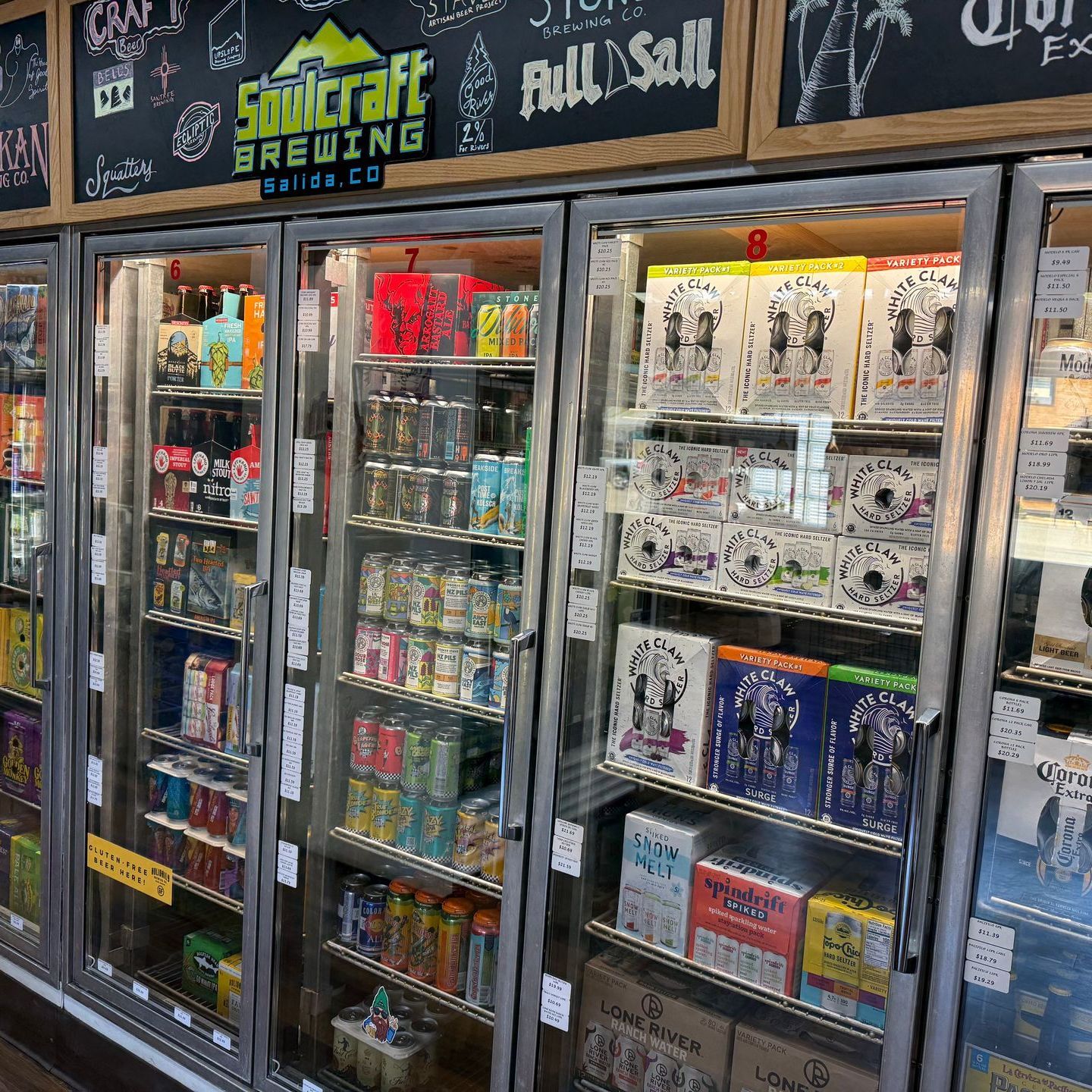A liquor store filled with lots of beer and soda.