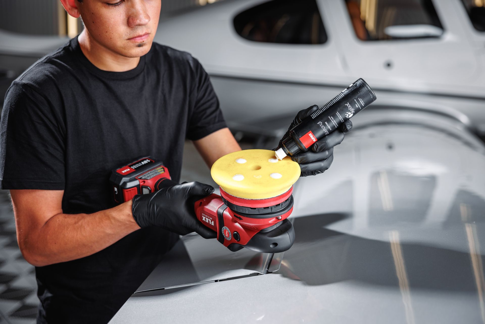 Polishing an airplane wing with a Flex brand polisher