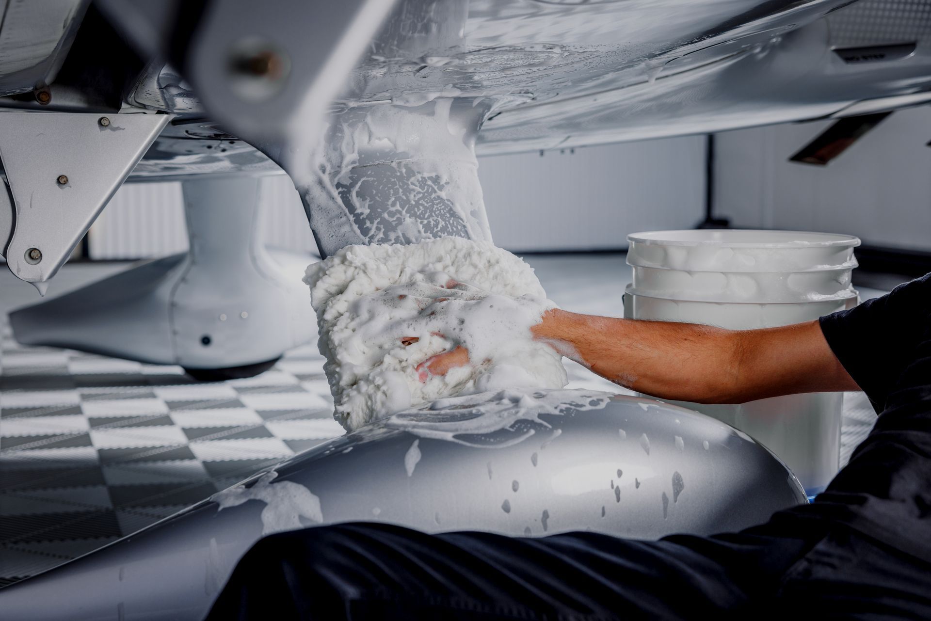 Cleaning an aircraft via a hand wash