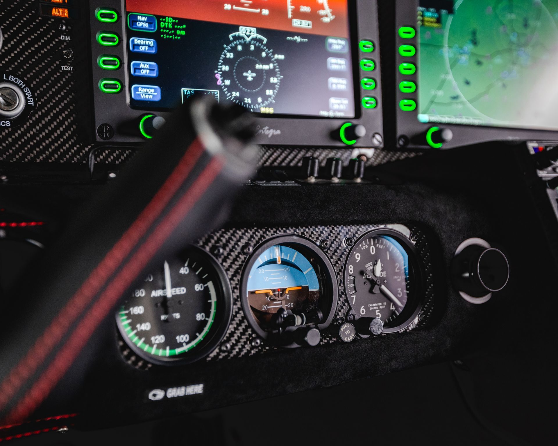 A close up of a aviation dashboard with a few gauges