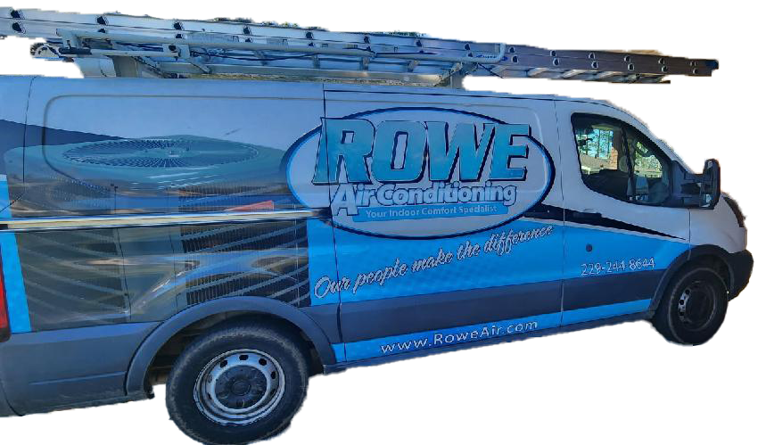 Man preparing to install a new air conditioner — Valdosta, GA — Rowe Air Conditioning
