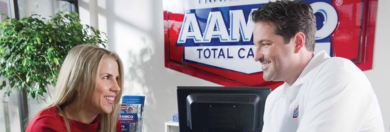 Customer at AAMCO service desk
