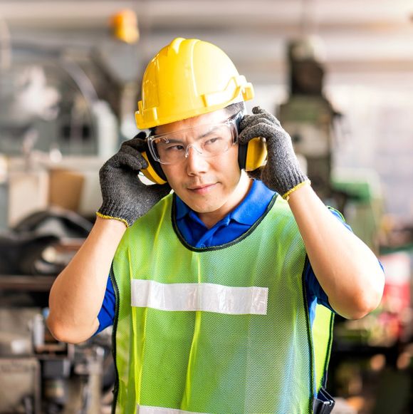 Professional Worker Wearing Personal Protective Equipment