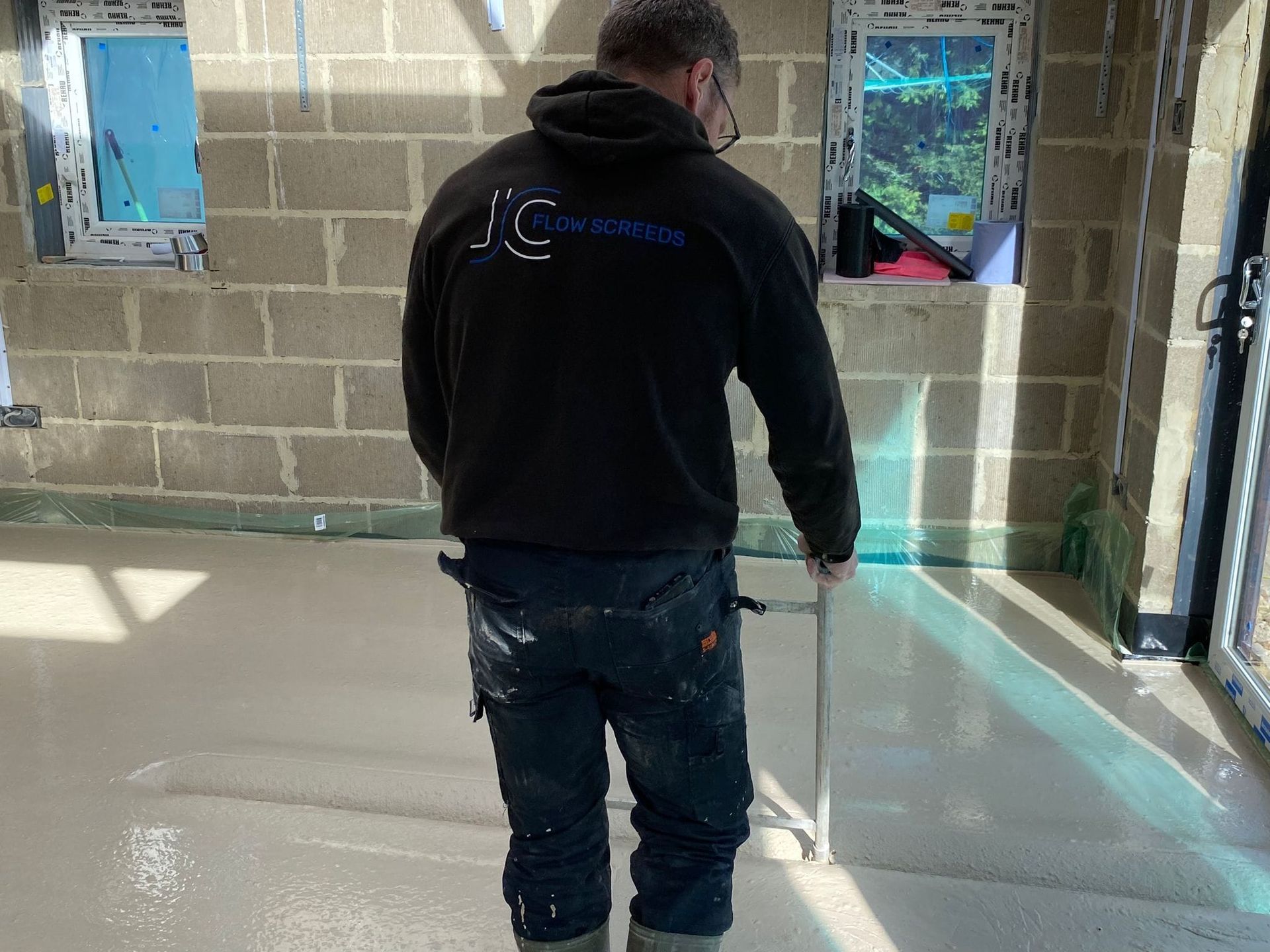 Liquid flow screed preparation, delivery and installation, removing liquid flow screed laitance, pump hire, by JC Flow Screeds in Essex.