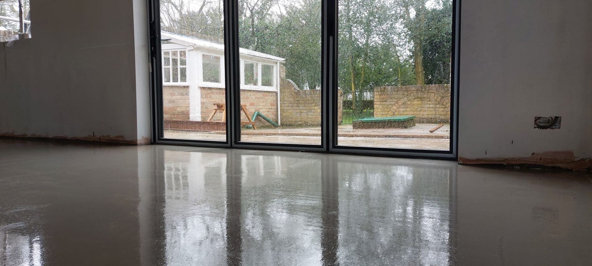 Liquid flow screed preparation, delivery and installation, removing liquid flow screed laitance, pump hire, by JC Flow Screeds in Essex.