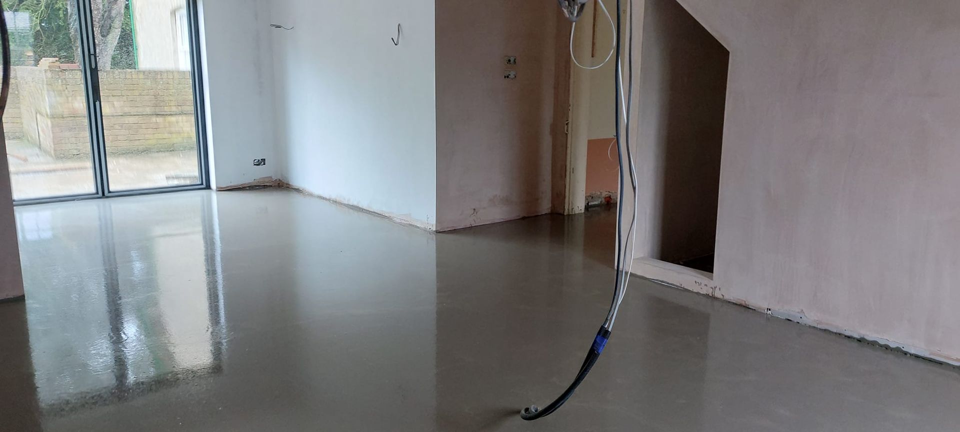 Liquid flow screed preparation, delivery and installation, removing liquid flow screed laitance, pump hire, by JC Flow Screeds in Essex.