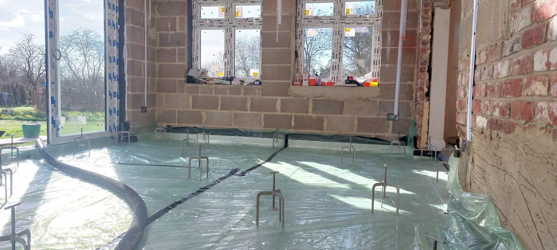 Liquid flow screed preparation, delivery and installation, removing liquid flow screed laitance, pump hire, by JC Flow Screeds in Essex.