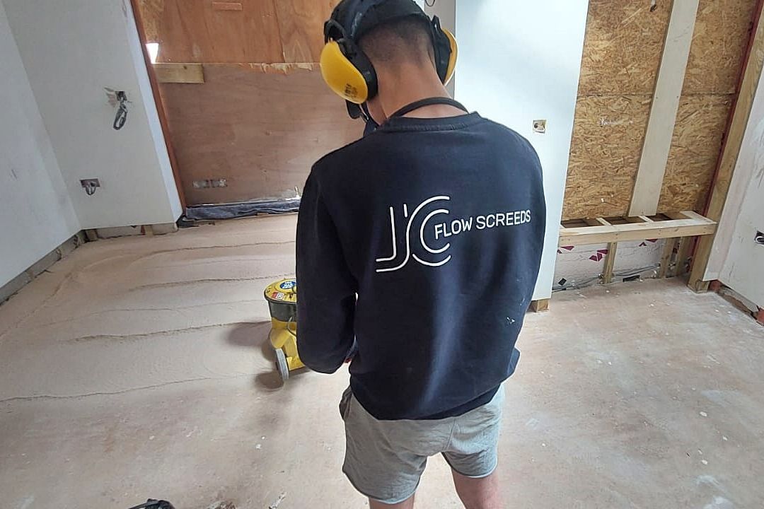 JC Flow Screeds removing liquid flow screed laitance