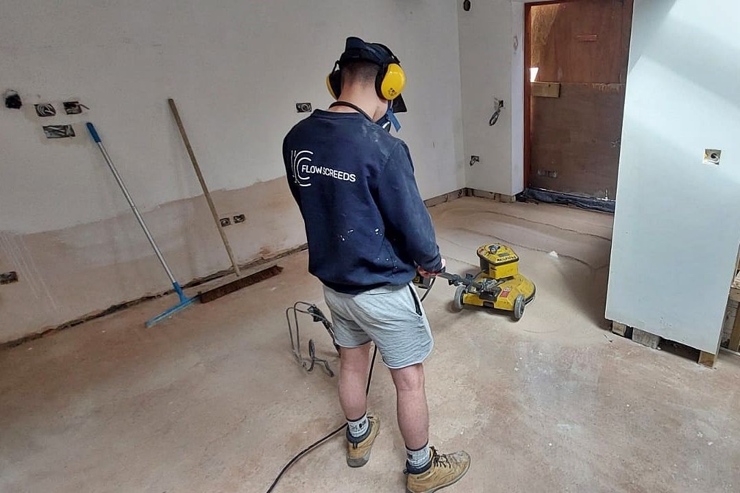 JC Flow Screeds removing liquid flow screed laitance