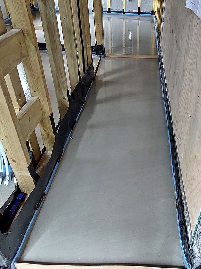 Images of Liquid flow screed preparation, delivery and installation, removing liquid flow screed laitance, pump hire, by JC Flow Screeds.  Covering floors across East Anglia.