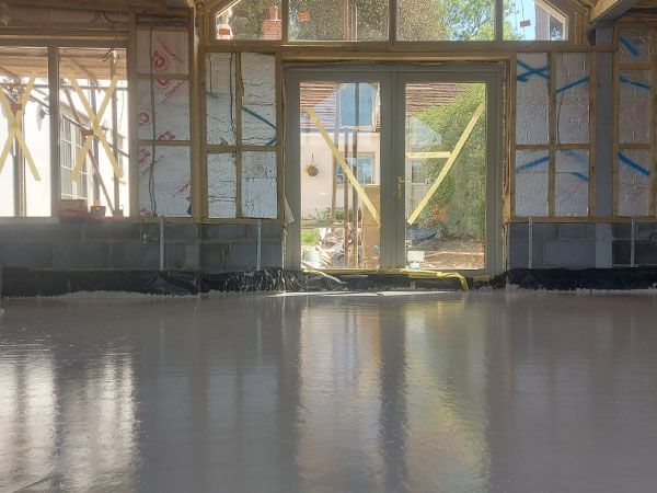 Liquid flow screed preparation, delivery and installation, removing liquid flow screed laitance, pump hire, by JC Flow Screeds in Essex.