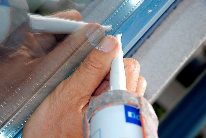 Leak Prone Areas caulking a window