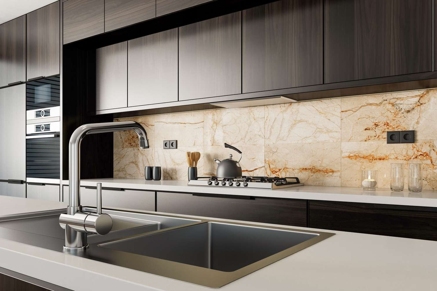 Modern kitchen with dark wood cabinets, stainless steel faucet, and beige backsplash.