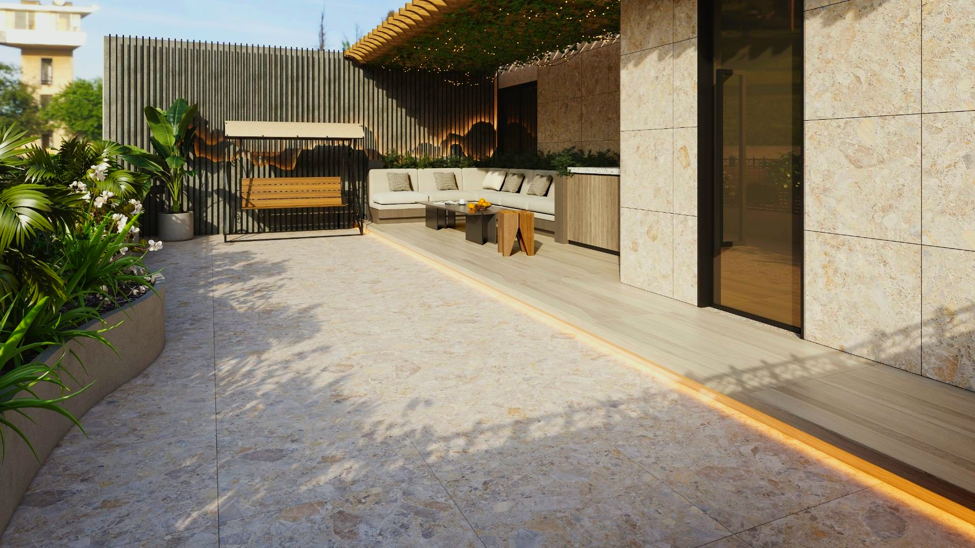 A patio with a swing and a bench.