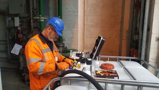 Engineer carrying out an on-site patch test
