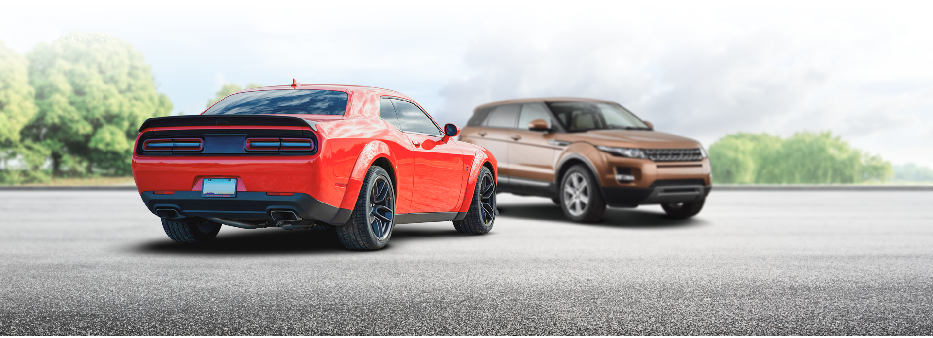 Red muscle car and bronze SUV on a gray road against a blurred background of trees and sky - Snap Towing & Recovery