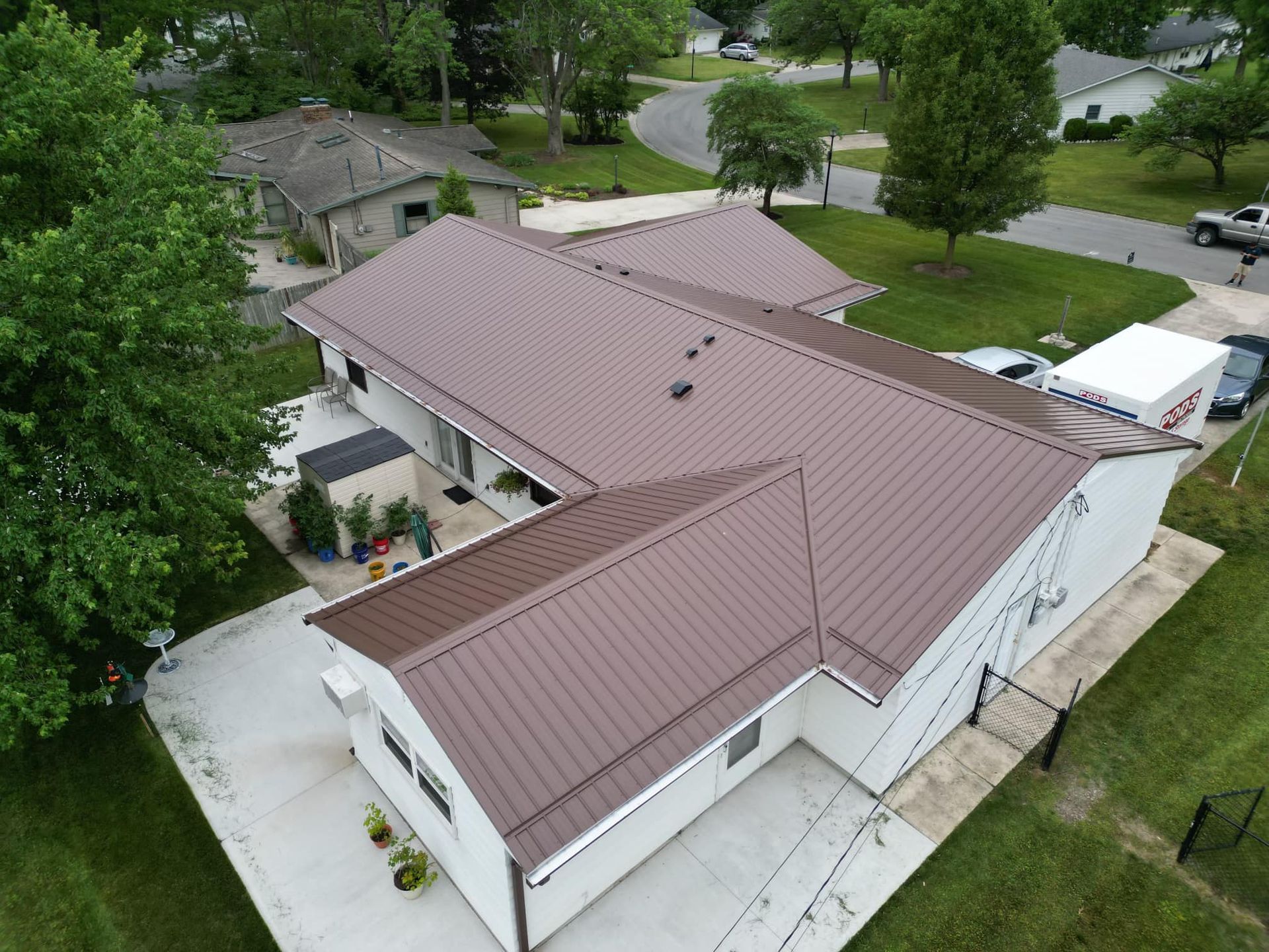 Maroon Metal Roof — Fort Wayne, IN — Exclusive Exterior Solutions