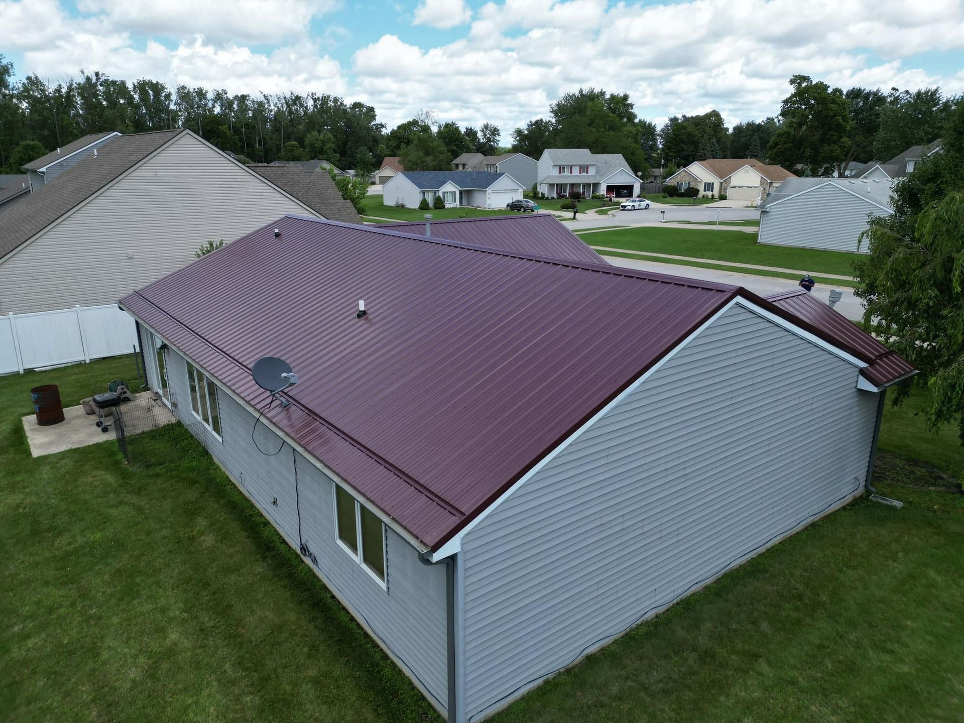 Maroon Shingle Roof — Fort Wayne, IN — Exclusive Exterior Solutions