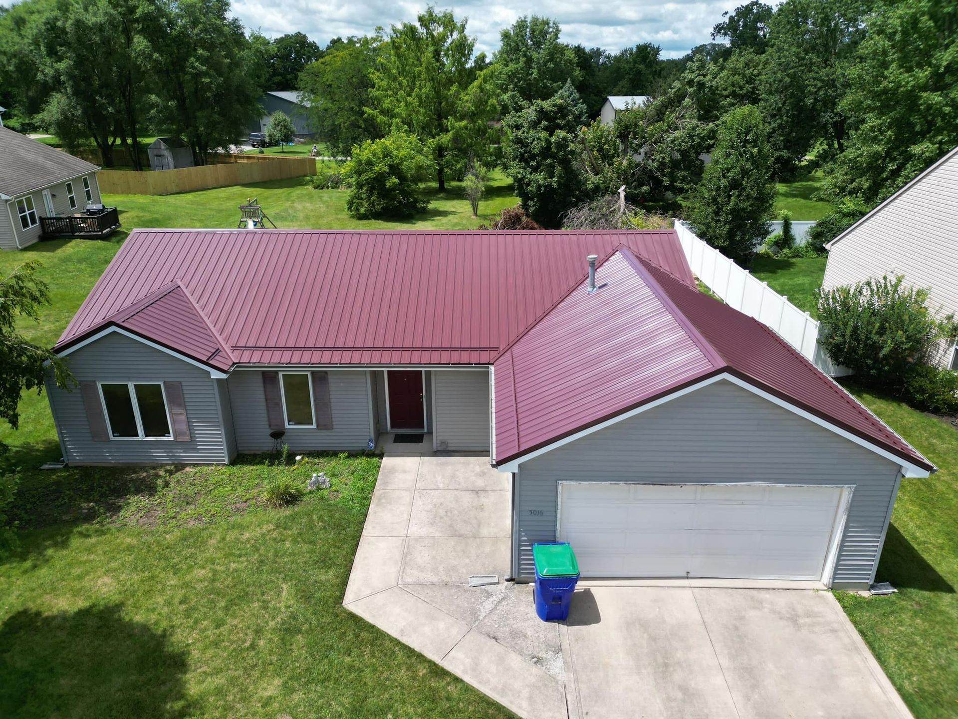 Maroon Roof — Fort Wayne, IN — Exclusive Exterior Solutions