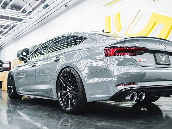 Glossy grey Audi rear view with ceramic coating