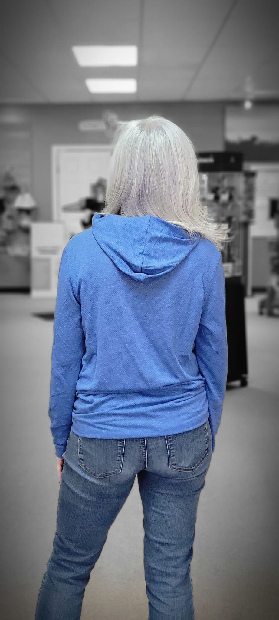 A Woman Wearing A Blue Hoodie And Jeans | Conway, AK | The Sporty Runner