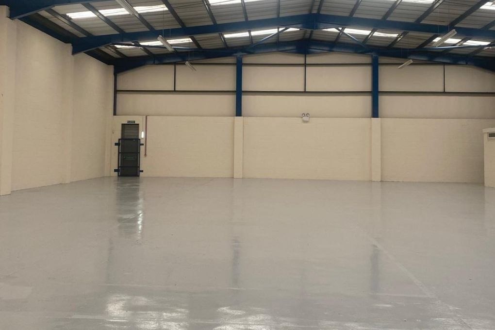 Liberty Painters and Decrators Kilmarnock painting the factory floor of an industrial unit