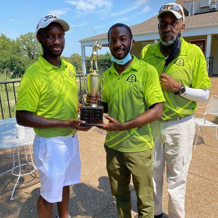 Three Men Wearing Green Polo | St. Louis, MO | Tee Masters Golf Club of St. Louis