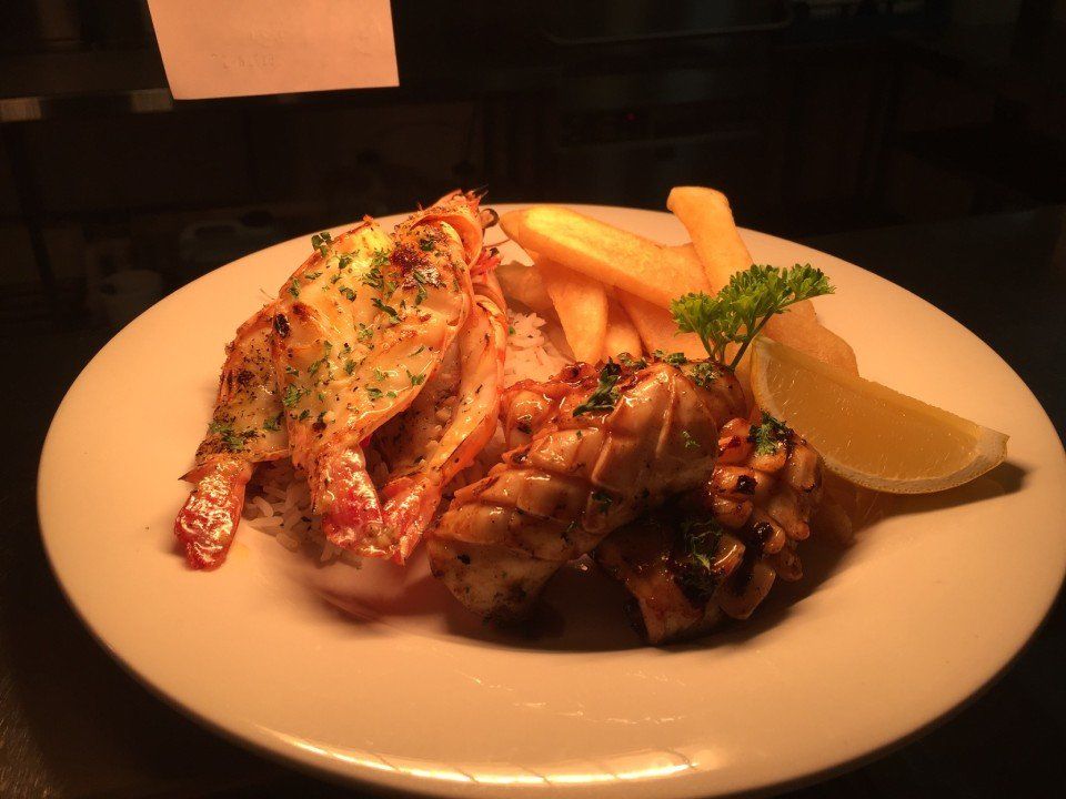 Dish served with slice of lemon