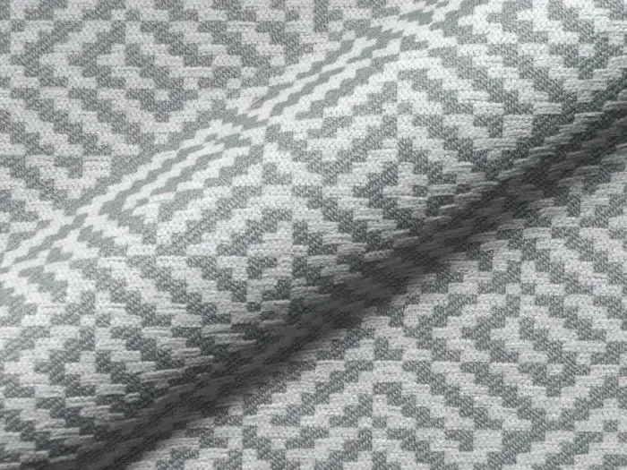 Eine Nahaufnahme eines Stücks Stoff mit einem Muster darauf