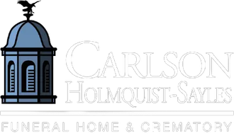 Logo for Carlson Holmquist-Sayles Funeral Home & Crematory featuring a blue cupola icon with an eagle weather vane.