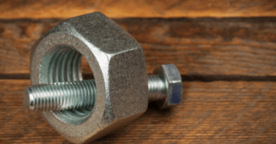 Image showing a bolt too small to fit with a large nut