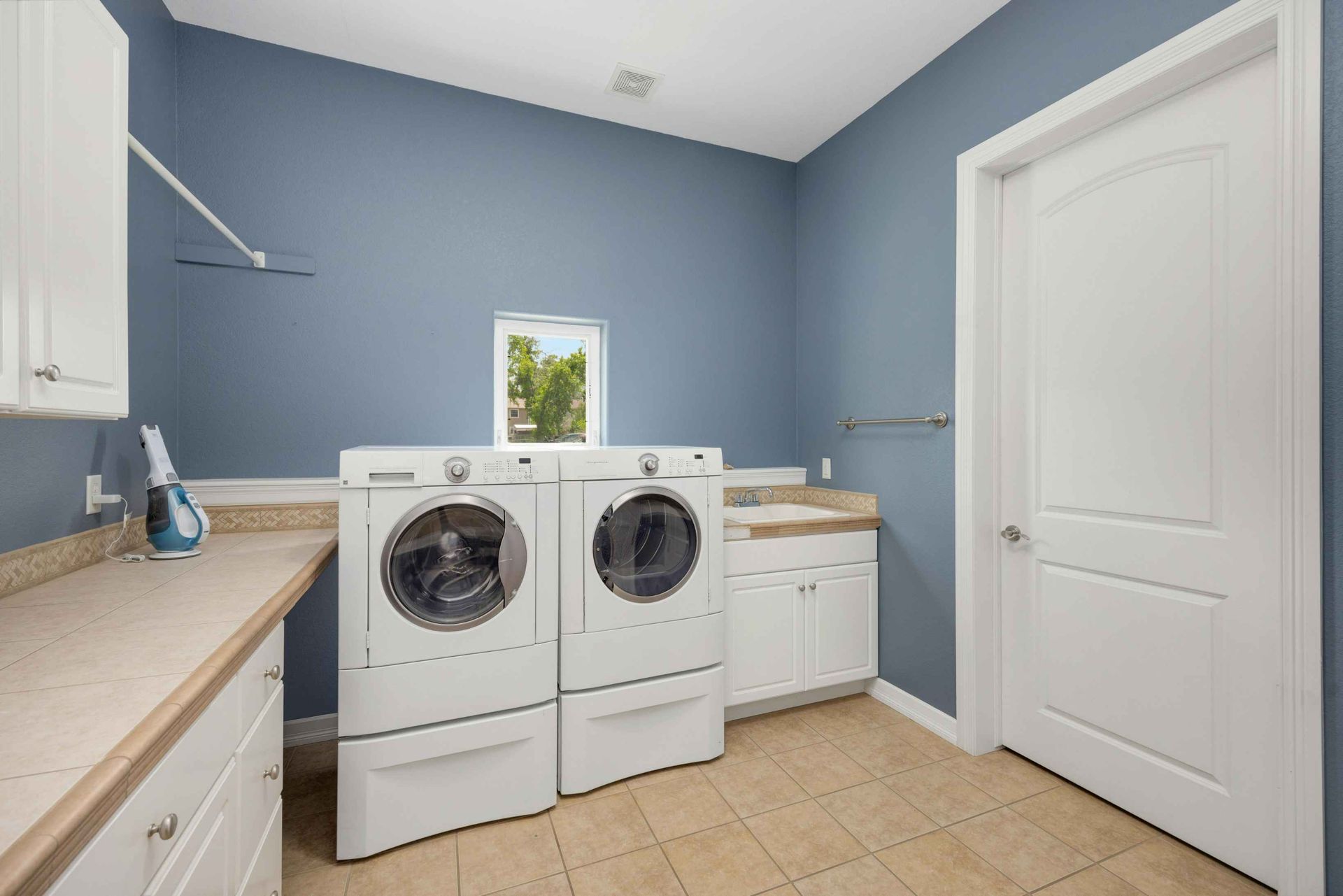 Newly renovated laundry room in a residential property in Wollongong NSW.