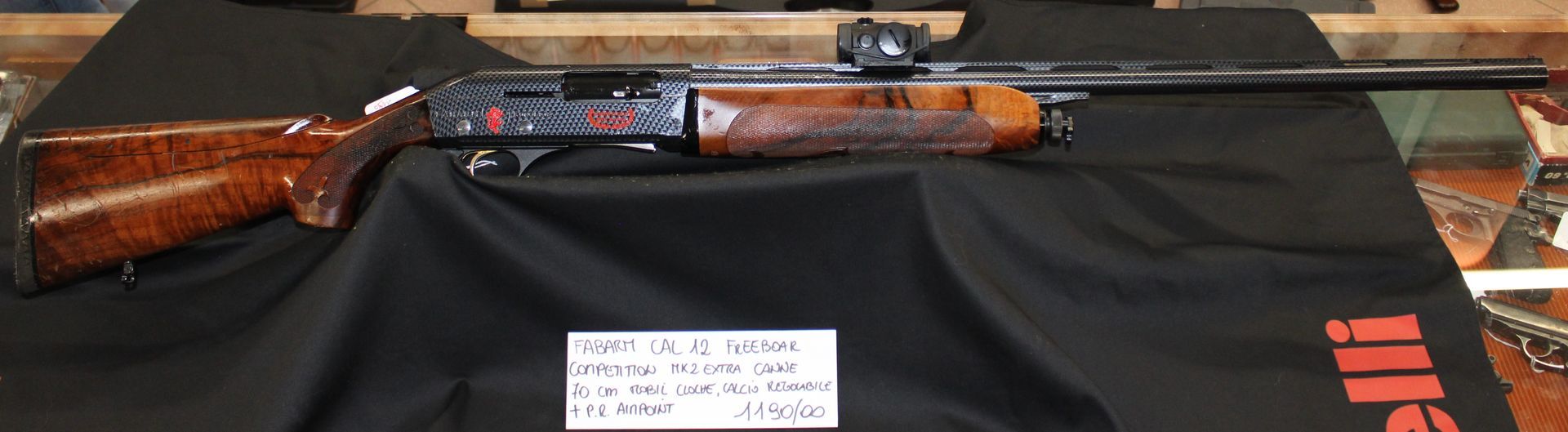 Fucile semiautomatico Fabarm calibro 12 modello Freeboar competition MK2Extra con canna da 70 centiemtri, mobil cloche e calcio regolabile. Comprensivo di punto rosso AIMPOINT. Prezzo di 1190,00€