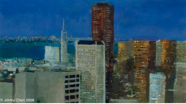 San Francisco skyline at dusk with blue sky and lit buildings.