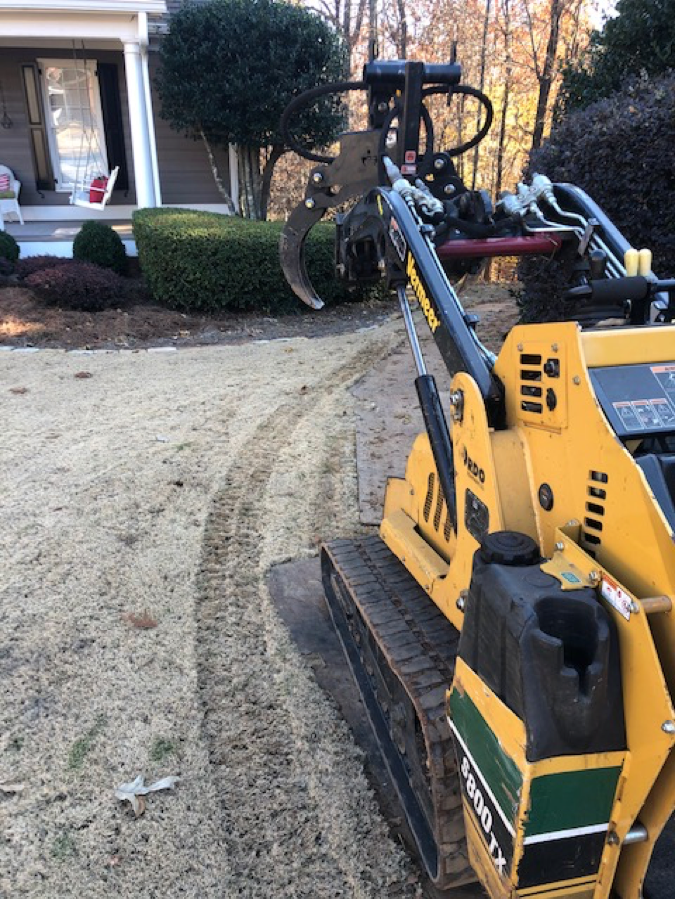 Tracks left on grass due to wide turn to avoid obstacles.