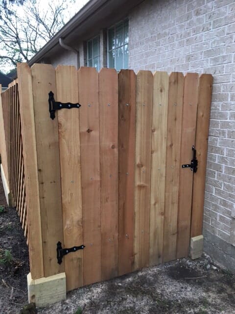 Repaired cedar fence gate — Fence Repair in Houston, TX