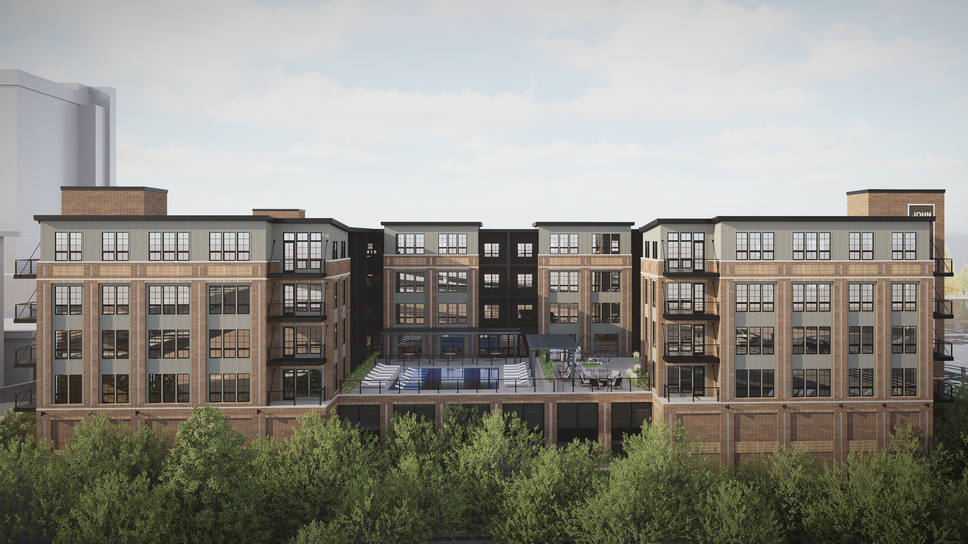 Modern apartment building with brick exterior, balconies, and rooftop pool. Green trees in foreground.