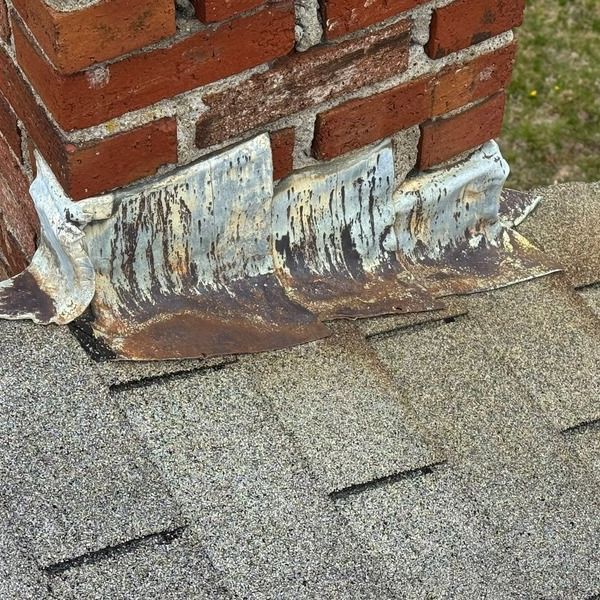Old and deteriorated chimney flashing