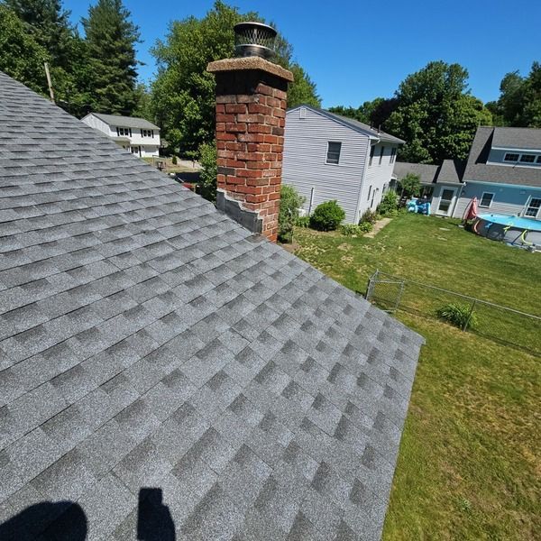 New roof and chimney flashing