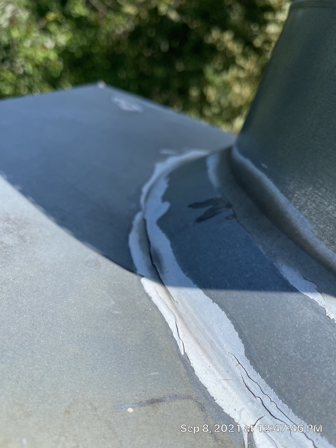 A close up of a gray surface with a white line on it.