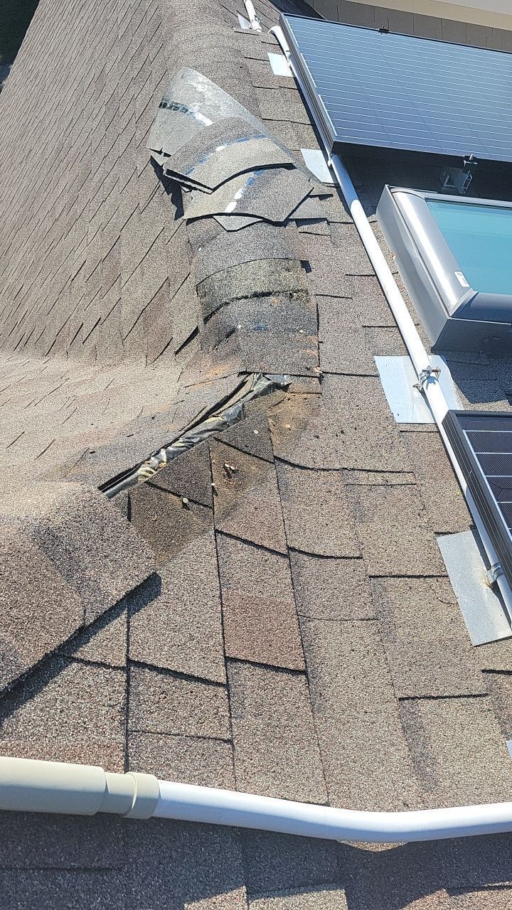 A close up of a roof with a hole in it