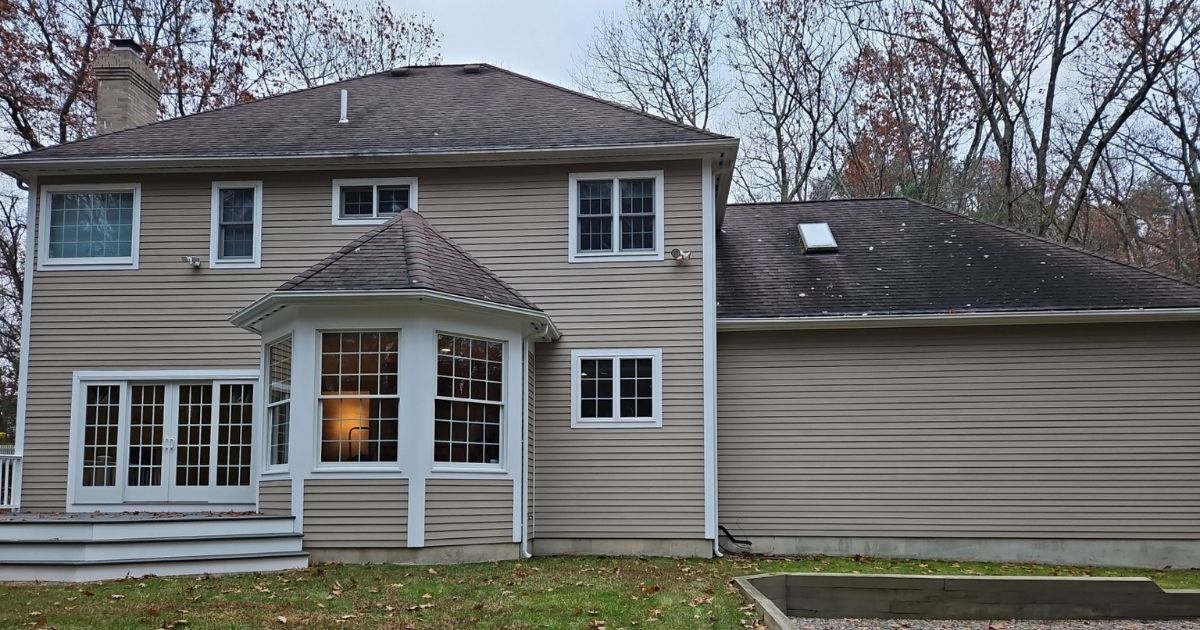rear of home with old roof
