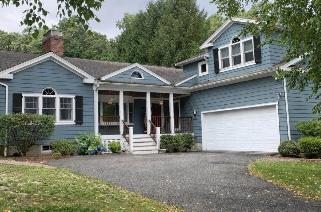 1958 Home with Master Roof truck in the driveway